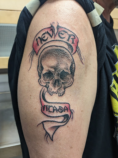 Explore tattoo ideas biker, creative tattoo ideas in Mantua, available at Evolution Tattoo Studio