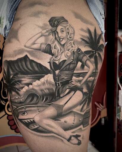 Explore small rose tattoo ideas, creative tattoo ideas in Honolulu, available at Sacred Art Tattoo Waikiki