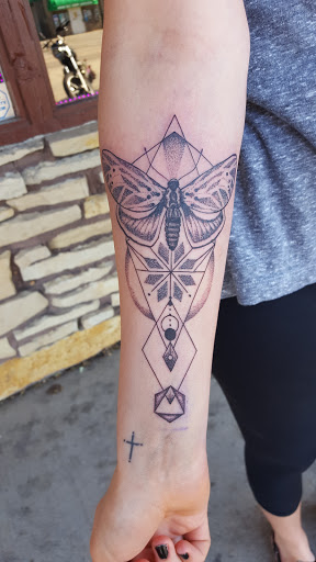 Explore tattoo ideas for a son's name, creative tattoo ideas in Roscoe, available at Elevated Ink Tattoo