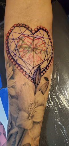 Find peacock tattoo ideas for your next unique tattoo in Fresno at Happy Client Tattoo