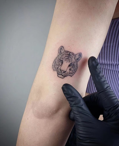 Explore mama bear tattoo ideas, creative tattoo ideas in Orange, available at Baron Art Tattoo