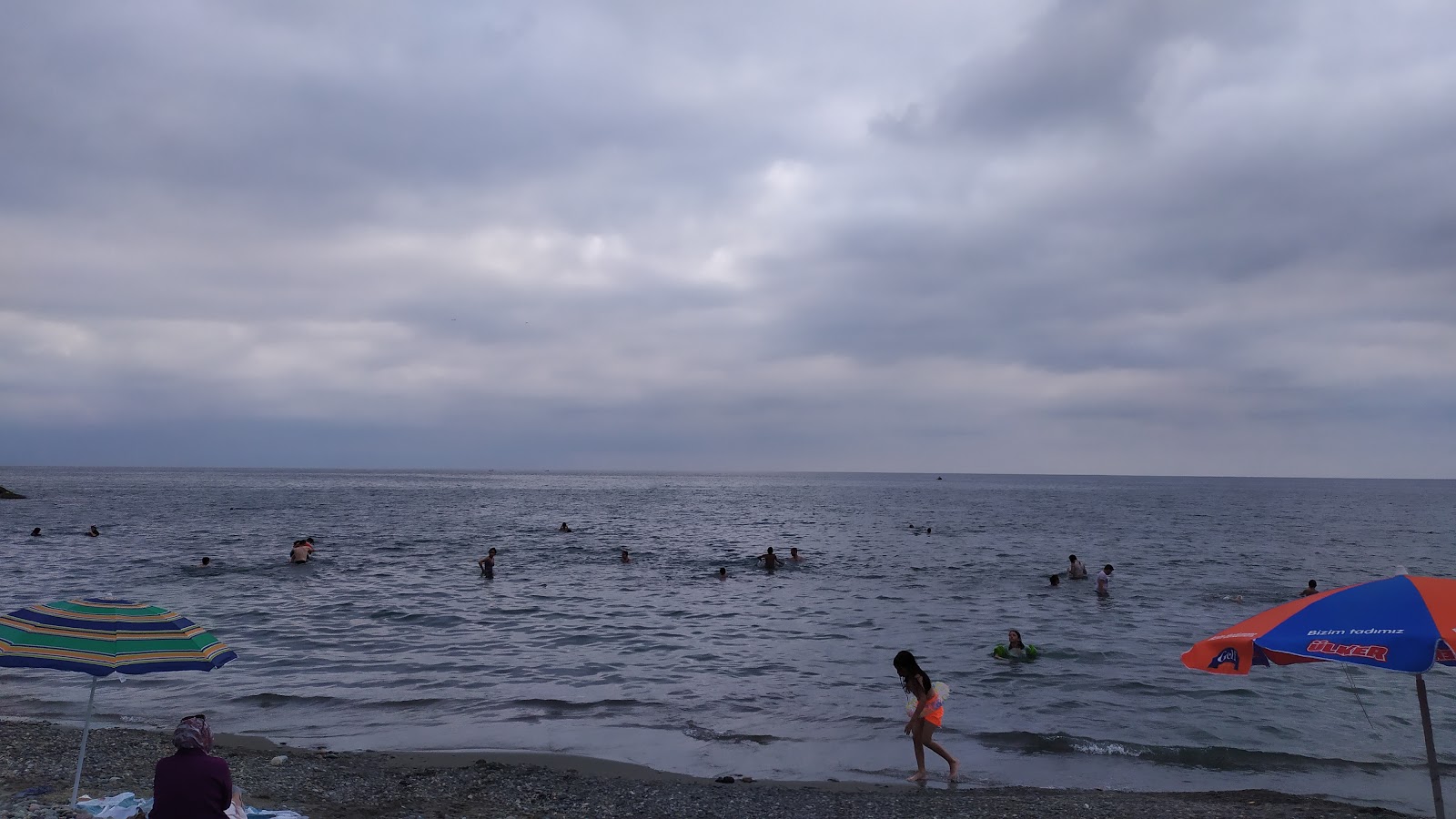 Fotografija Kiyicik Family Beach z turkizna čista voda površino