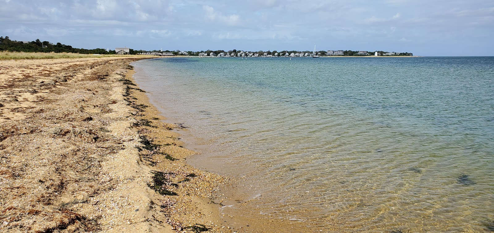 Photo of Chappaquiddick Beach with turquoise water surface