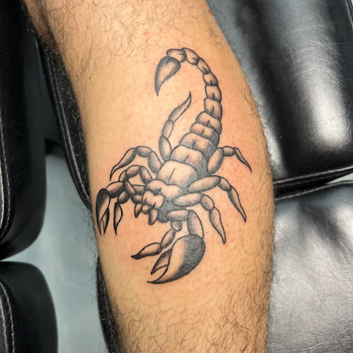 Explore tooled leather tattoo ideas, creative tattoo ideas in Rowlett, available at Ink Sirens Tattoo & Piercing Studio