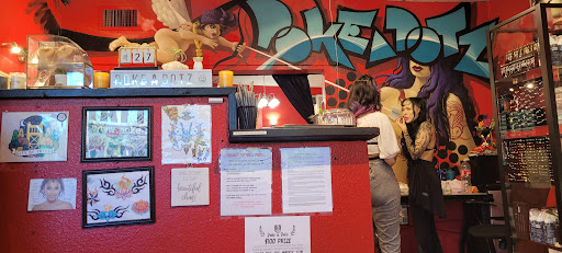 Find tattoo crown ideas for your next unique tattoo in Sacramento at Poke A Dotz Tattoos and Piercings