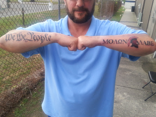 Explore area code tattoo ideas, creative tattoo ideas in Fayetteville, available at Evolution Ink Tattoo and Piercing Studio