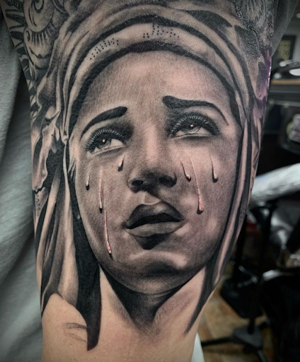 Explore singer tattoo ideas, creative tattoo ideas in Wichita Falls, available at Firme Copias Tattoo shop