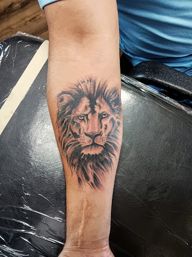Explore trio tattoo ideas, creative tattoo ideas in Angola, available at SafeHouse Ink