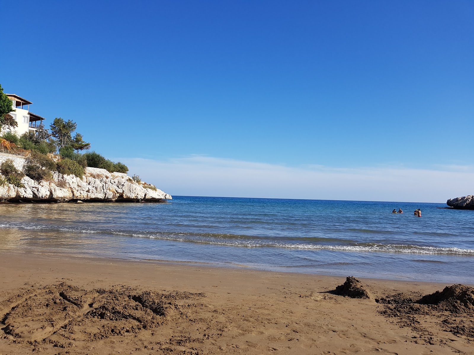Fotografie cu Sultankoy beach cu o suprafață de nisip beige fin