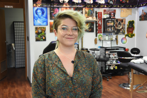 Explore hand tattoo ideas, creative tattoo ideas in Des Moines, available at All Seeing Eye Tattoo