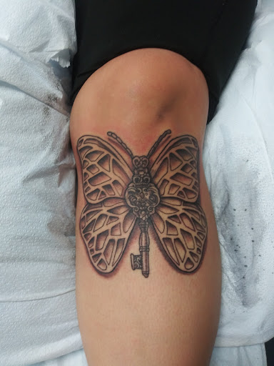 Explore small money tattoo ideas, creative tattoo ideas in Buford, available at Inked Arts Tattoo Studio