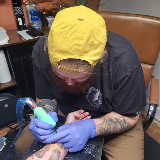 Explore fishing tattoo ideas for females, creative tattoo ideas in Peoria, available at Iron Key Tattoo Studio Inc.