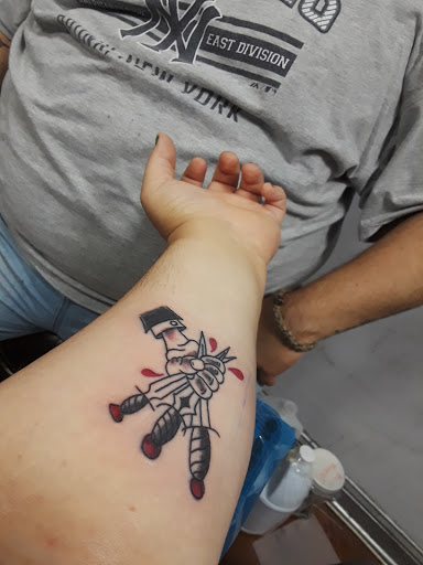 Tattoo Shop «Sub Q Tattoo & Body Piercing», reviews and photos, 2 W Main St, Middletown, NY 10940, USA