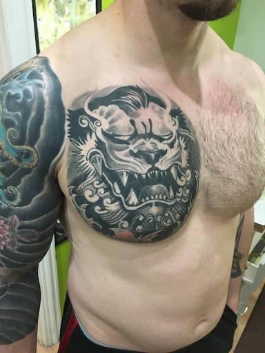 Explore family sleeve tattoo ideas for males, creative tattoo ideas in Peru, available at Fade To Black Tattoo Studio