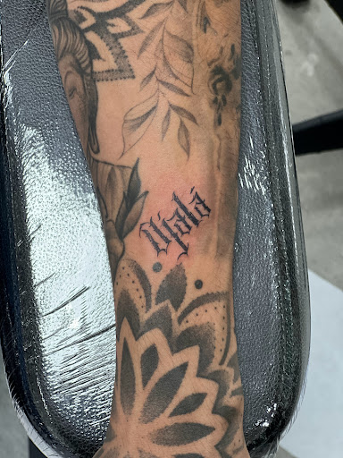 Explore tattoo ideas on leg for men, creative tattoo ideas in Charlotte, available at Gilded Unicorn Tattoo Parlor