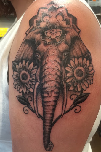 Explore tattoo flag ideas, creative tattoo ideas in Provincetown, available at Coastline Tattoo Studio Provincetown