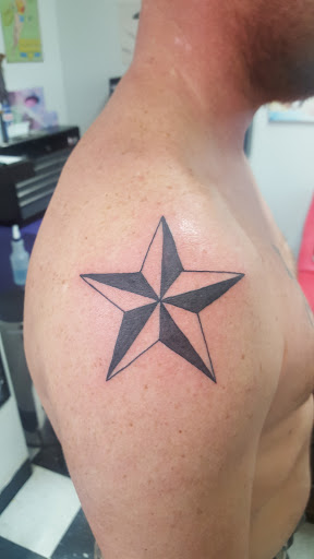 Tattoo Shop «Mitten Mayhem Tattoos and Piercings», reviews and photos, 1189 N Nottawa St b, Sturgis, MI 49091, USA