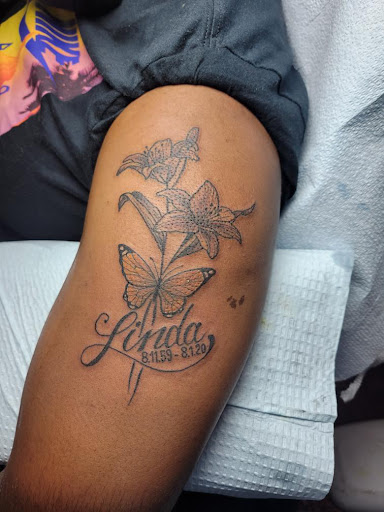 Explore arm tribal tattoo cover up ideas, creative tattoo ideas in Libertyville, available at Lucky Seven Tattoo
