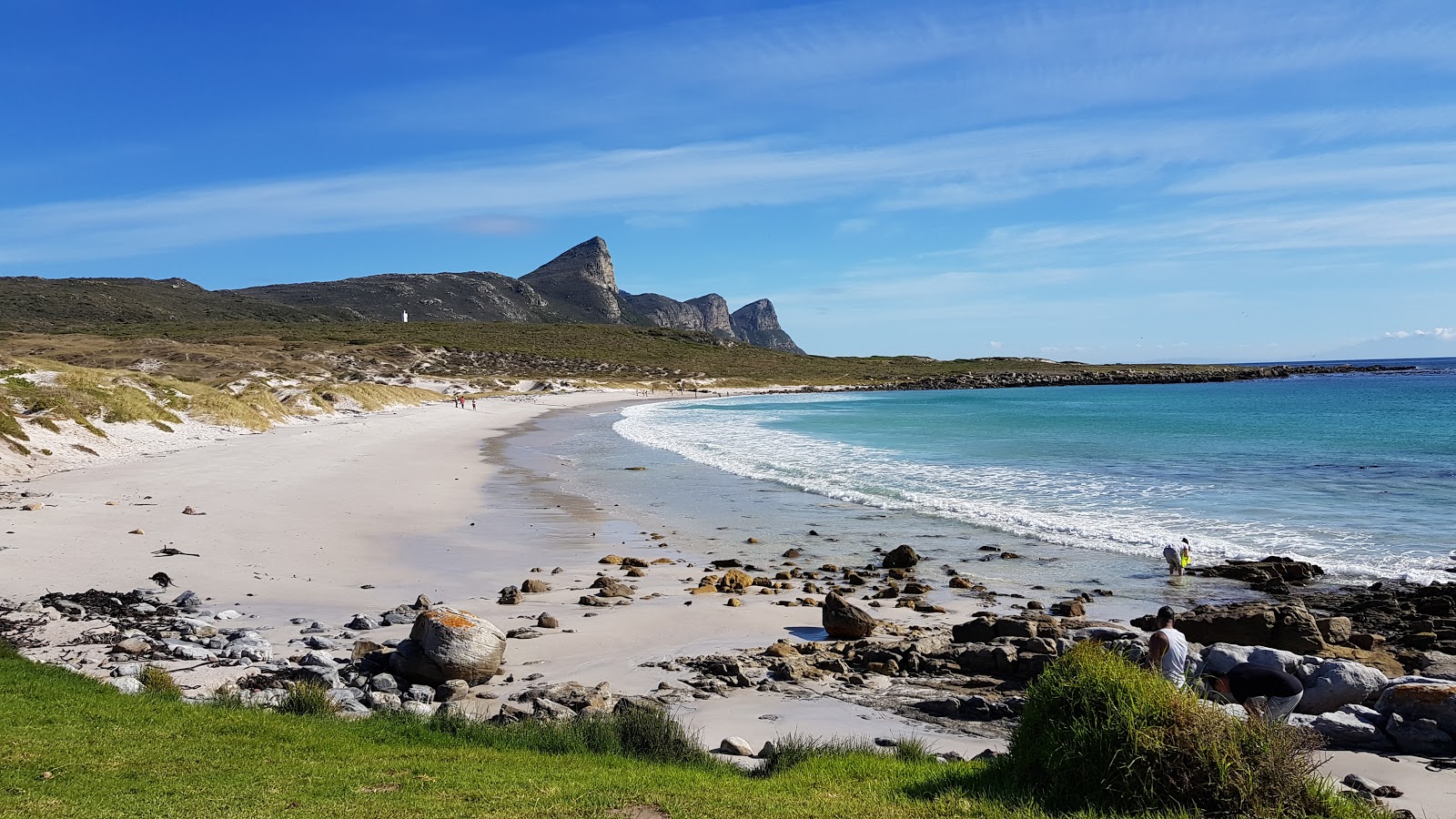 Foto von Buffels Bay beach mit feiner beiger sand Oberfläche