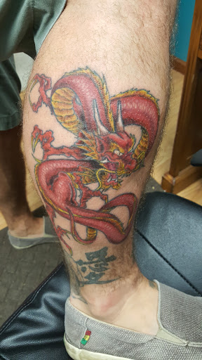 Explore dark angel tattoo ideas, creative tattoo ideas in Peoria, available at Guerrilla Ink Tattoos