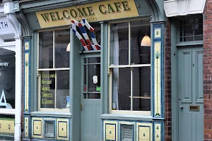 The Posh Off-License (The Welcome Cafe) image