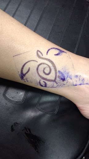 Explore rapper tattoo ideas, creative tattoo ideas in Kailua Kona, available at Big Island Tattoo & Piercing