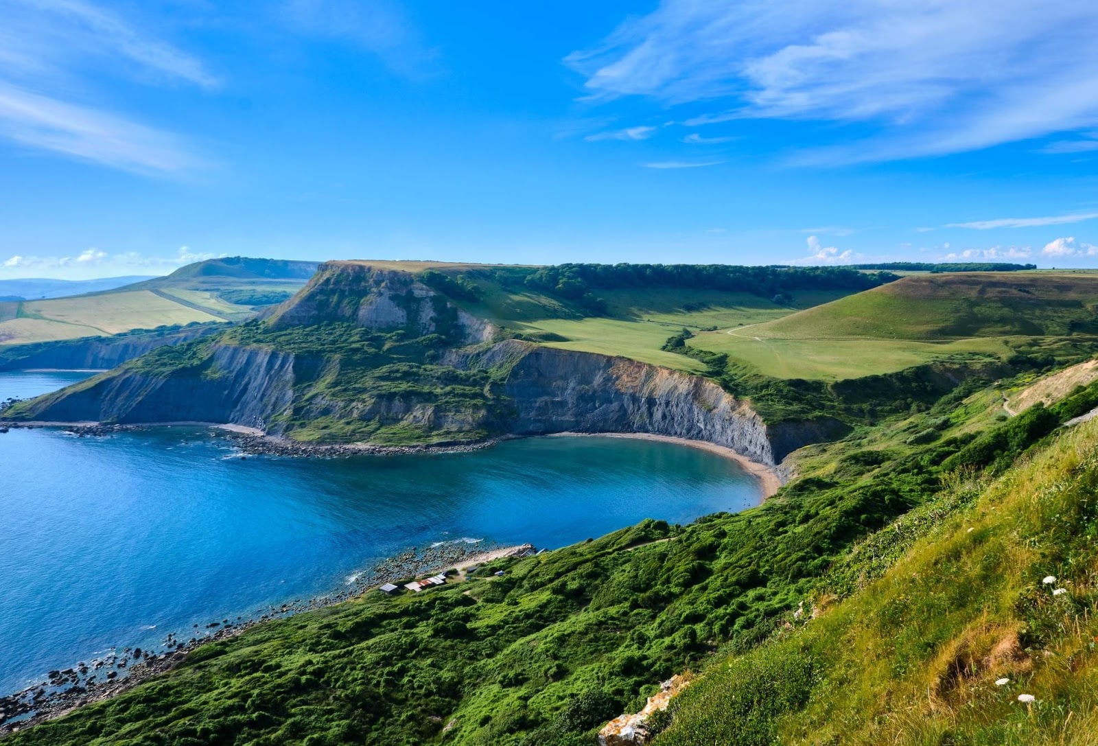 Foto av Chapman's Pool med beige småsten yta