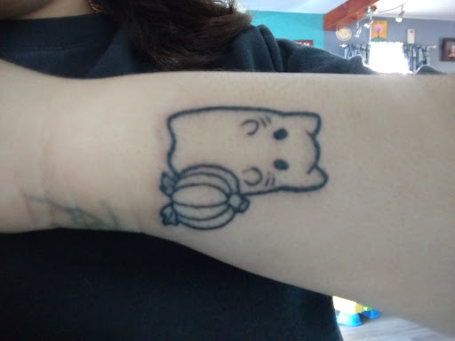 Explore hustle tattoo ideas, creative tattoo ideas in Hampton, available at Blue Horseshoe Tattoo and Body Piercing