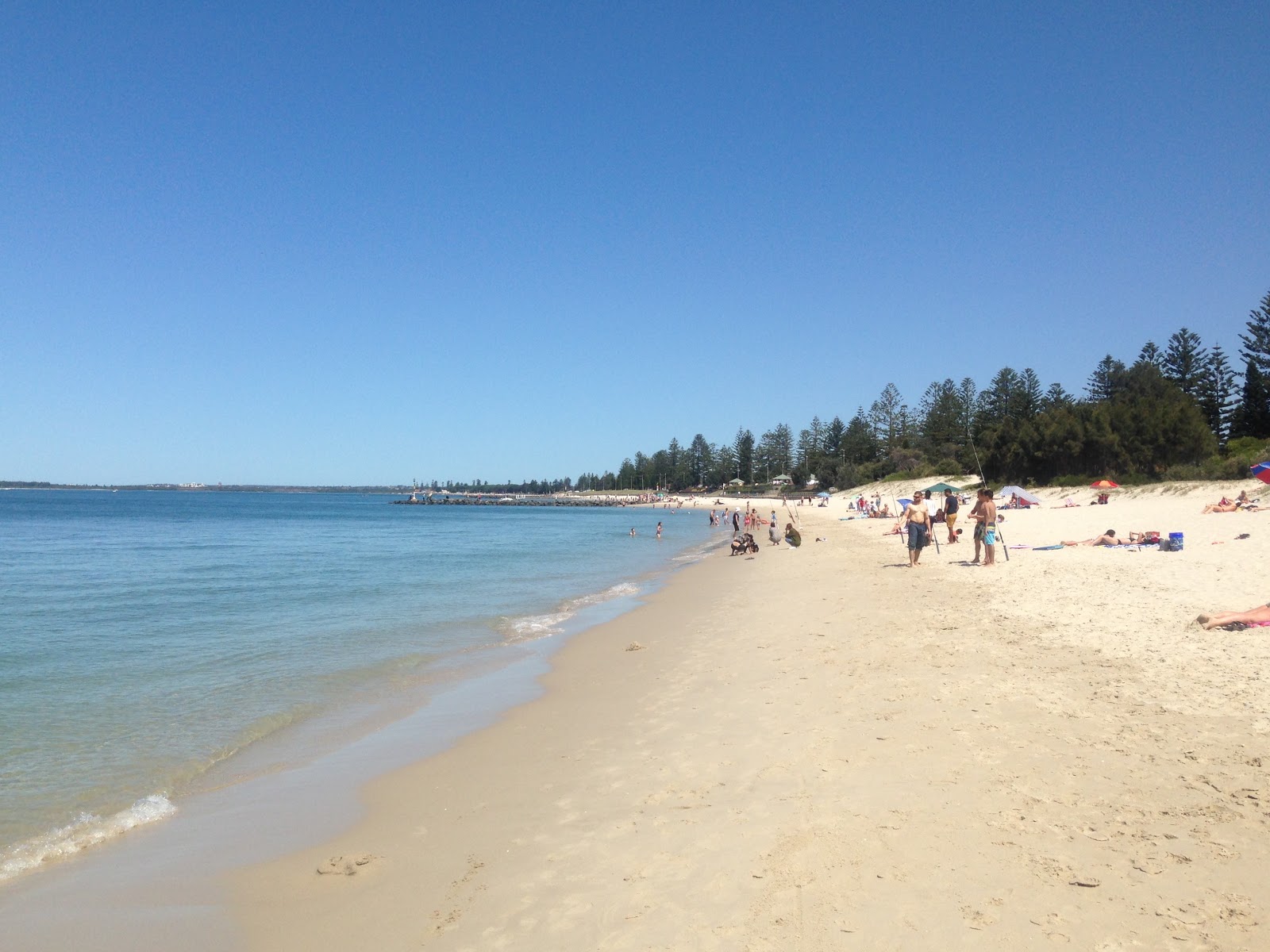 Foto av Brighton-Le-Sands Beach med beige sand yta