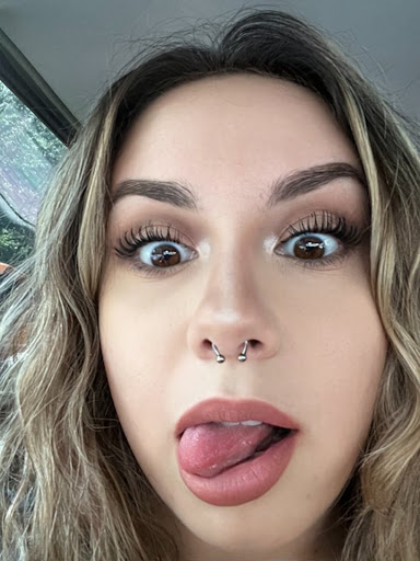 Explore female throat tattoo ideas, creative tattoo ideas in Davenport, available at Fine Ink Studios Tattoos