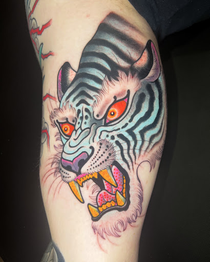 Explore tattoo ideas on the side, creative tattoo ideas in Redding, available at Iron Mountain Tattoo