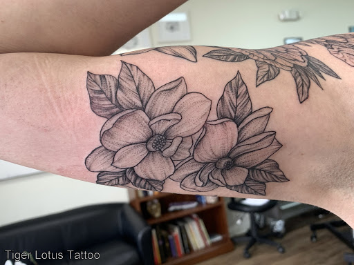 Explore greek sleeve tattoo ideas, creative tattoo ideas in Fort Myers, available at Tiger Lotus Tattoo and Piercing