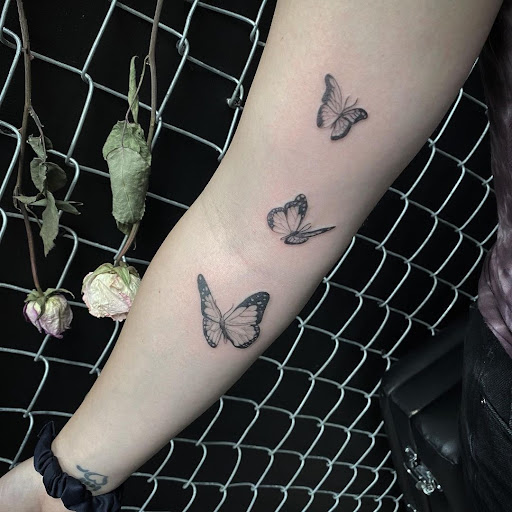 Explore tattoo sleeve filler ideas for a man, creative tattoo ideas in Buffalo, available at True Gloom Tattoo Studio