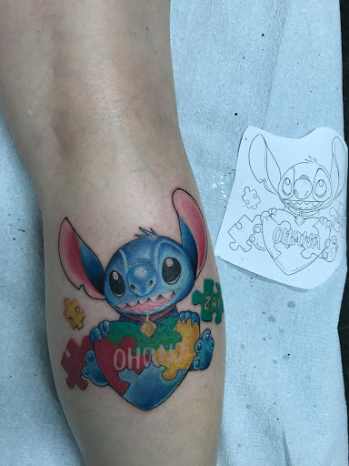 Explore mother and child tattoo ideas, creative tattoo ideas in Council Bluffs, available at Lil Bros Tattoo