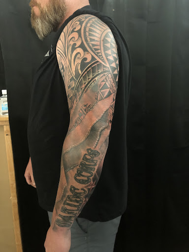 Explore lower arm tattoos ideas for guys, creative tattoo ideas in Port Orange, available at Port Orange Tattoo and Art Parlor