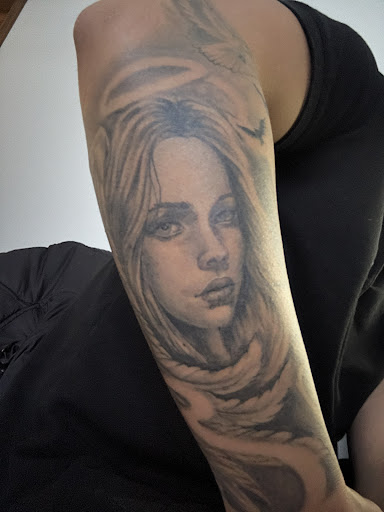 Find red indian tattoo ideas for your next unique tattoo in Saint Paul Park at Lady Liberty Tattoo