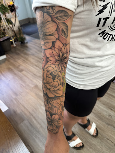 Explore maltese cross tattoo ideas, creative tattoo ideas in Donora, available at Alchemy Arts Tattoo & Permanent Makeup Studio