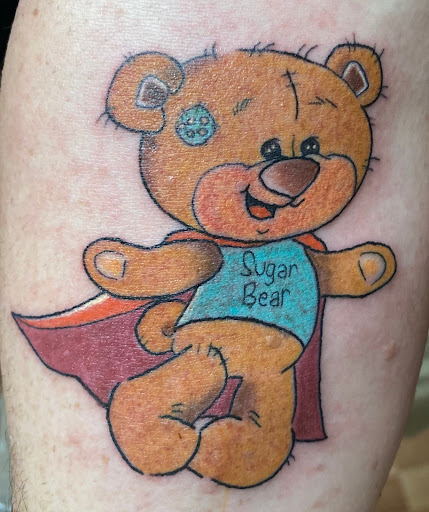 Explore tattoo mom ideas, creative tattoo ideas in Benton, available at Spectrum Tattoo