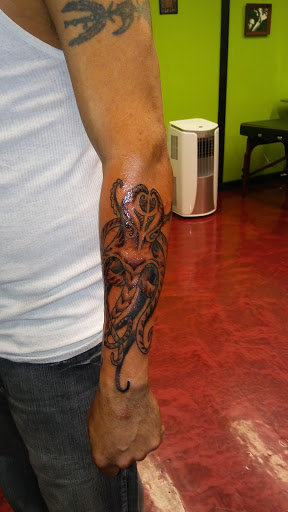 Explore man utd tattoo ideas, creative tattoo ideas in Hernando, available at Blue Panther Tattoo Co