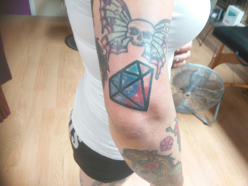 Explore dark tattoo ideas for men, creative tattoo ideas in La Crosse, available at La Crosse Tattoo