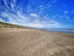 Camber sands beach'in fotoğrafı - rahatlamayı sevenler arasında popüler bir yer
