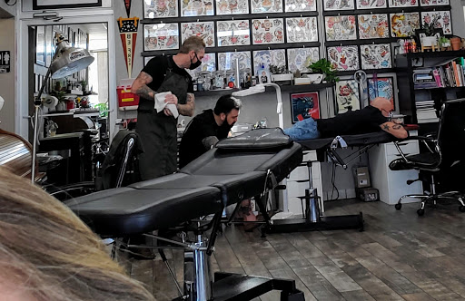 Explore mens tattoo wedding ring ideas, creative tattoo ideas in Lakeland, available at Black Swan Tattoo