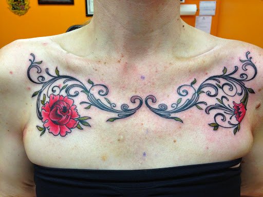 Explore chest arm tattoo ideas, creative tattoo ideas in Everett, available at Tattoosmith & Company
