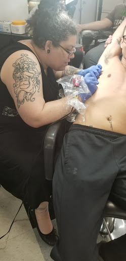 Tattoo Shop «Ink Slingers», reviews and photos, 1355 E Kearney St, Springfield, MO 65803, USA