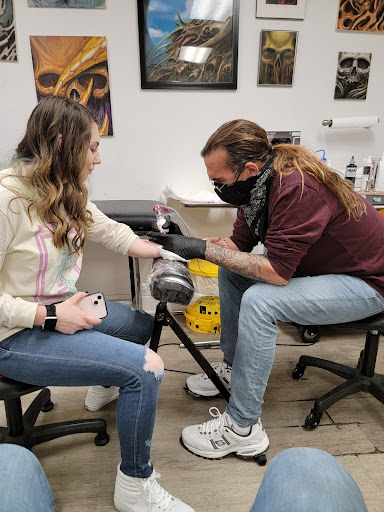 Explore awesome half sleeve tattoo ideas, creative tattoo ideas in Thomasville, available at Top Ink