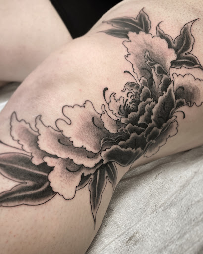 Find dc tattoo ideas for your next unique tattoo in Altoona at Electric Wave Tattoo