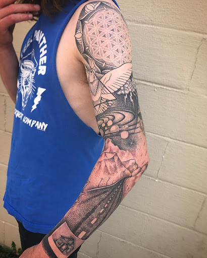 Explore full neck tattoos ideas, creative tattoo ideas in Ann Arbor, available at Lucky Monkey Tattoo Parlour