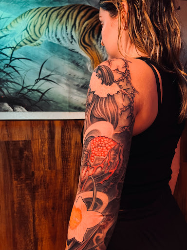 Explore marathon tattoo ideas for guys, creative tattoo ideas in Hudson, available at The Bohemian Social Club