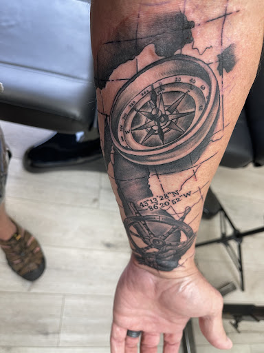 Explore tattoo ideas behind the ear, creative tattoo ideas in Grand Haven, available at Ink Haven Tattoo Studio