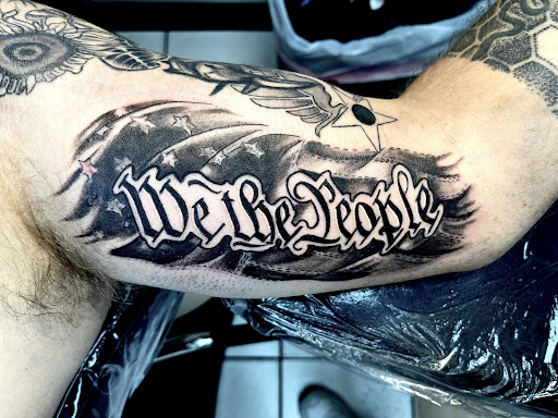 Explore tribal wolf tattoo ideas, creative tattoo ideas in Tampa, available at Las Vegas Tattoo Co